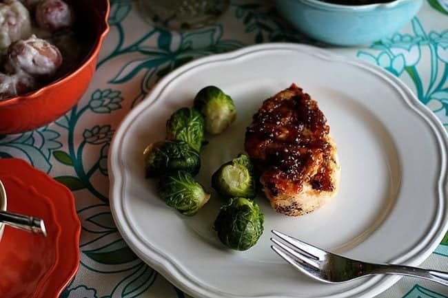 Bourbon Bacon Jam - Brussels sprout and chicken in a White Plate