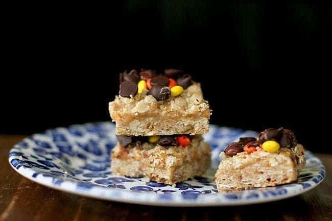 Oatmeal Dream Bars with creamy peanut butter filling in a blue plate