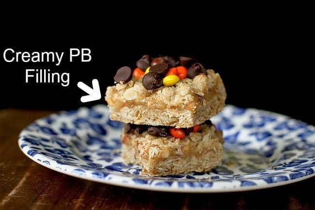 Oatmeal Dream Bars with creamy peanut butter filling in a blue plate