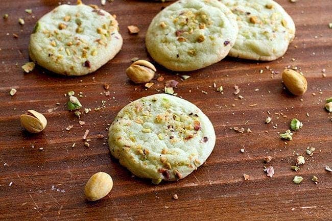 Four Pieces Pistachio Pudding Cookies on Wood Background