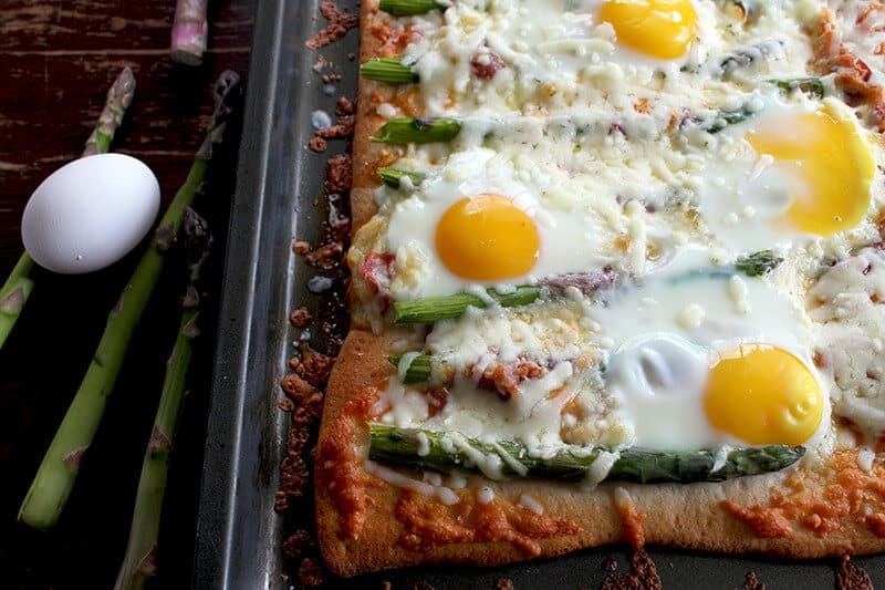 Asparagus, Capicollo & Egg Breakfast Pizza in a baking sheet