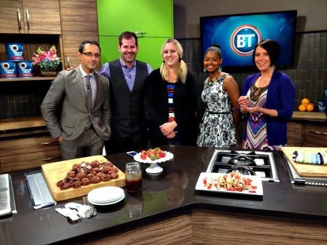 group picture in the kitchen with the staff of Breakfast Television