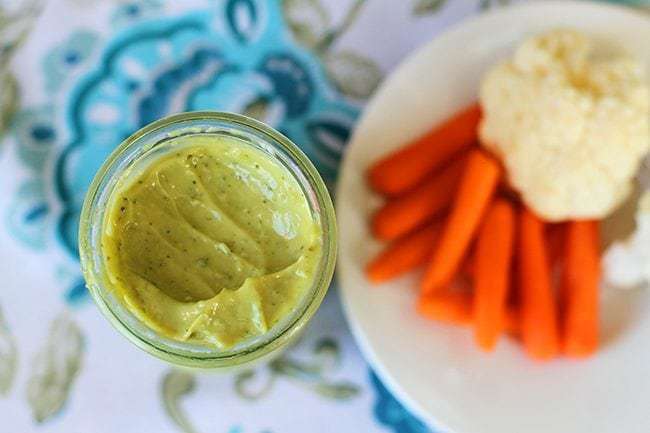 Top down shot of Homemade Honey, Lime & Garlic Avocado Dressing