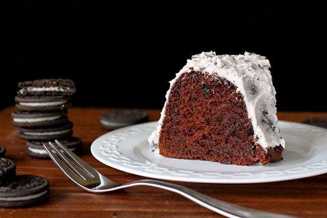 A slice of Homemade Double Chocolate Oreo Cake with Oreo Buttercream Icing