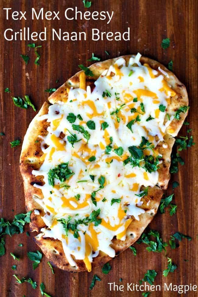 Five minutes is all you need to make this amazing Tex Mex Cheese covered naan bread! Grill it on the BBQ or in the oven, either way it's amazing! #naan #cheese 