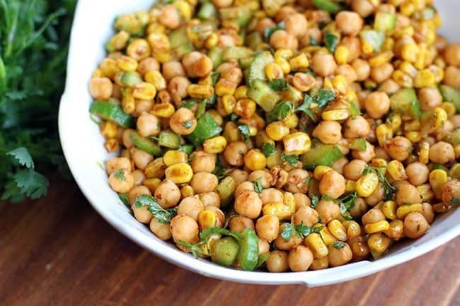 Close up Roasted Corn & Chickpea Salad on a white square bowl