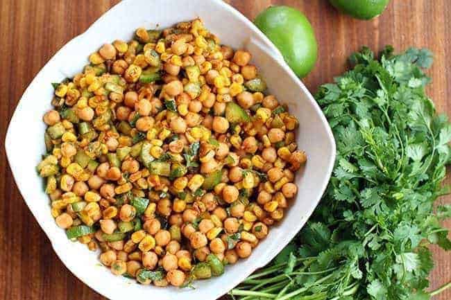 Close up Roasted Corn & Chickpea Salad on a white square bowl