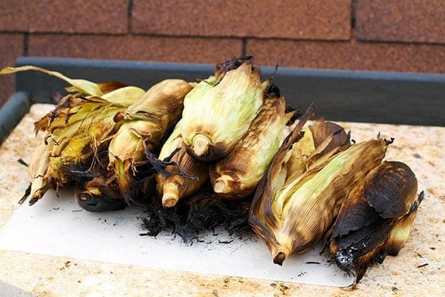 File of Roasted Corn on the Cob With Husks