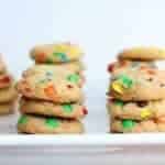 Stacks of colorful Mini Cookies in a white tray