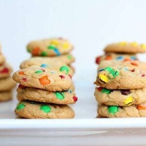 Stacks of colorful Mini Cookies in a white tray