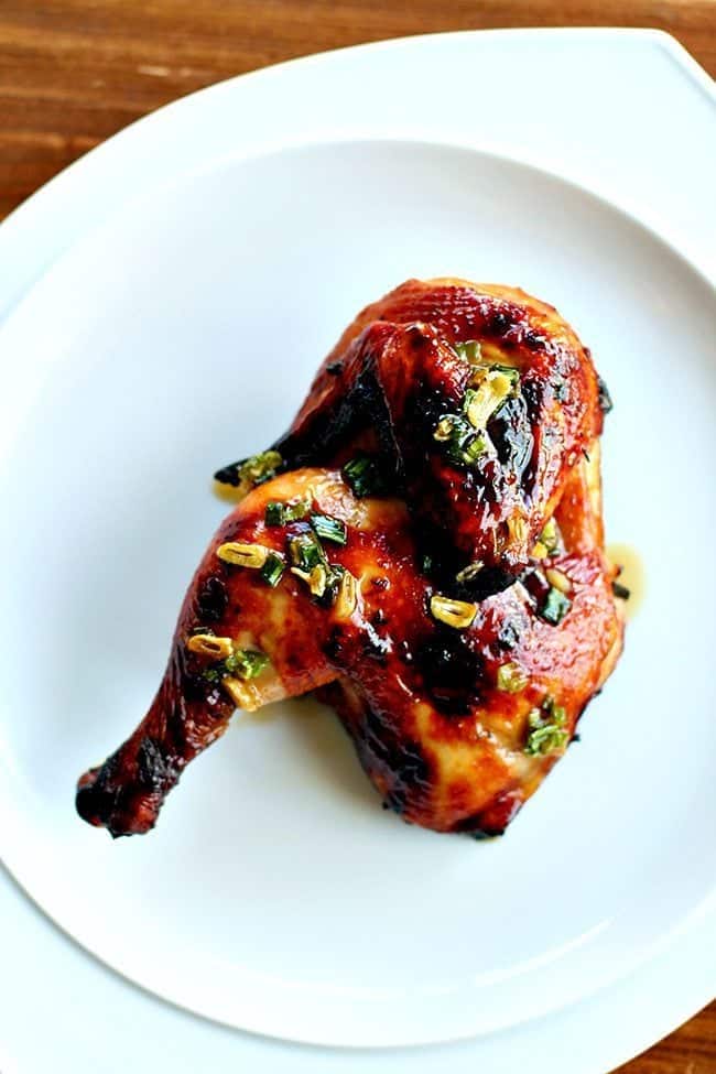 close up of Healthier BBQ Honey Sesame Chicken in white plate