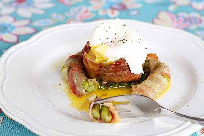 Steak n' Egg Bacon Asparagus Nests in a White Plate