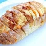 close up of Bacon & Cheese Pull Apart Loaf in a white plate