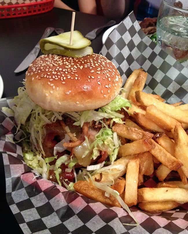 A serving of Downtowner burger with large price on the side