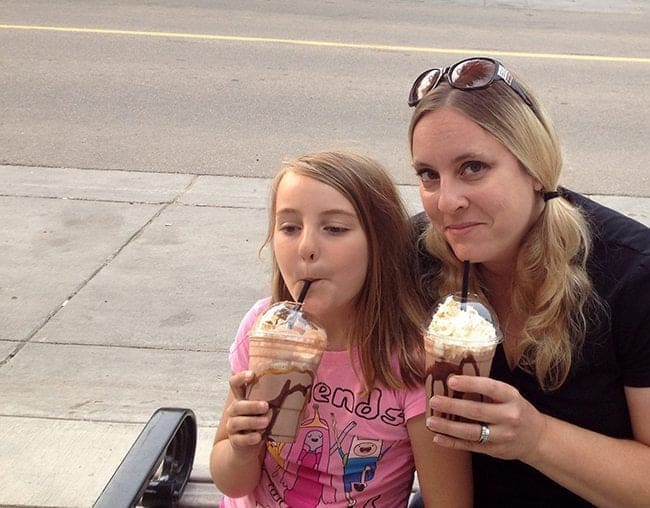 mom and daughter enjoying their drinks