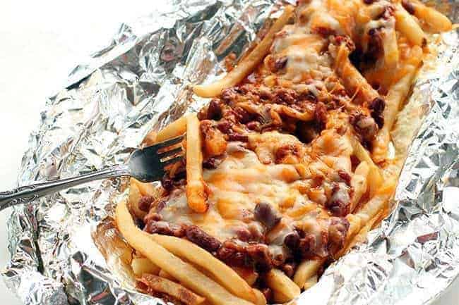 campfire chili cheese fries in tin foil