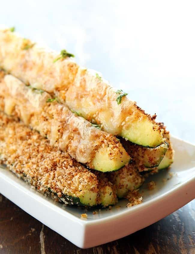 Cheesy & Crunchy Tex-Mex Zucchini Sticks in a rectangular white plate