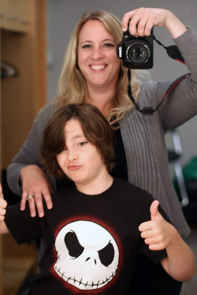 selfie picture of son and mother in the mirror