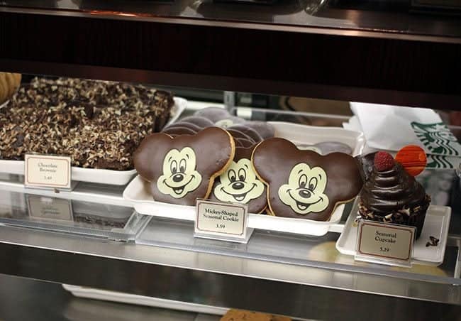 chocolate Mickey shaped cookie at Starbucks Disney on the tray