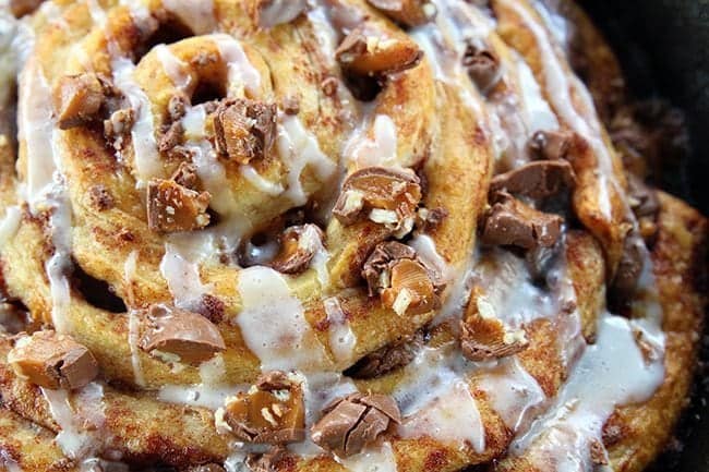 close up of Two Ingredient Giant Turtles Cinnamon Bun top with icing