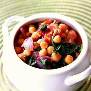 Spinach, Tomato & Chickpea Stew in a white pot like bowl