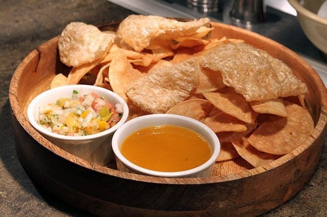 chips and dip platter in wooden tray