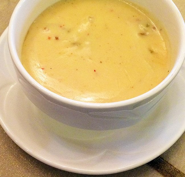 sunchoke or Jerusalem Artichoke soup in a white bowl set