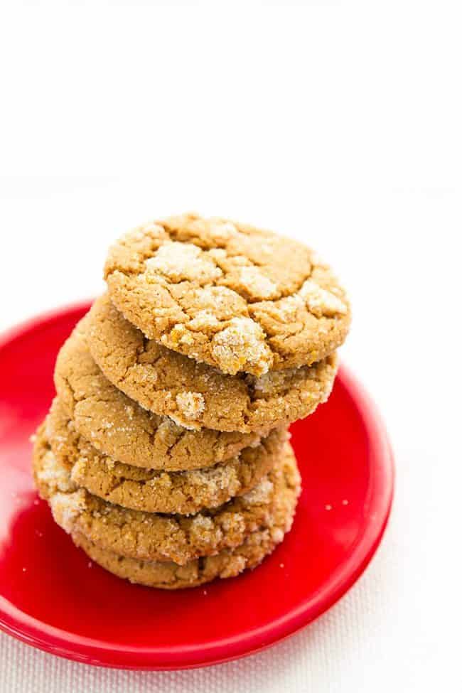 stack of Chewy Citrus Gingerbread Cookies in red plate