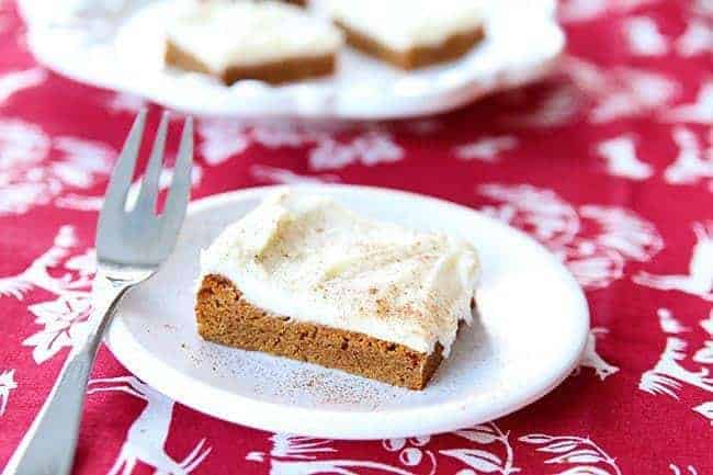 Close up slice of Gingersnap Cookie Bars With Cream Cheese Buttercream Icing