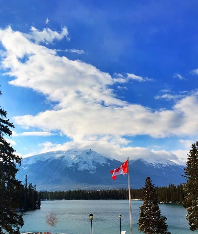 amazing mountain scenery with Canadian flag