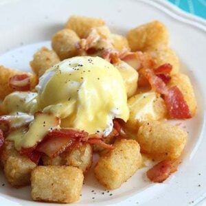 close up plate of Tater Tot Eggs Benedict