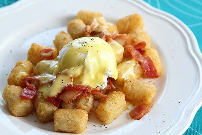 Tater Tot Eggs Benedict in a white plate