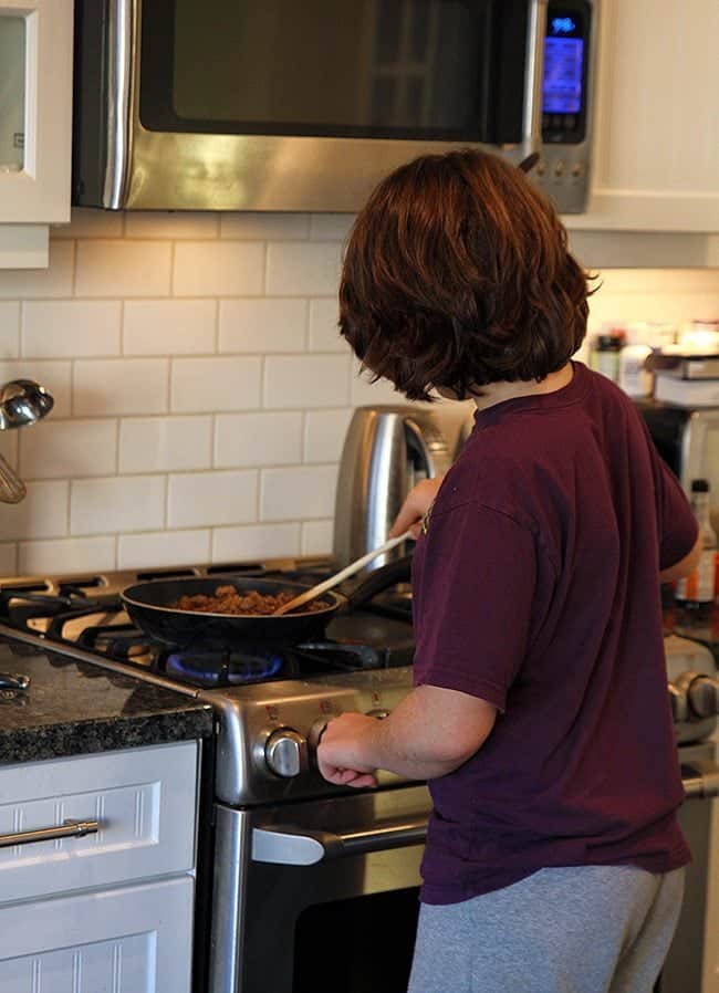 frying up the ground beef