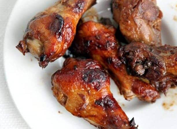 close up of Baked Honey Sesame Chicken Wings in white plate