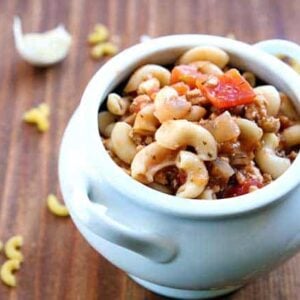Italian Turkey Macaroni Soup in white bowl with handles on sides