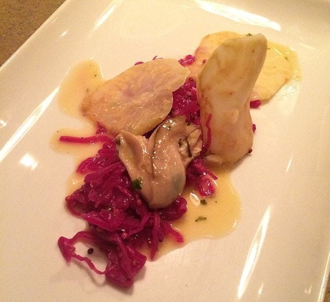 oyster and cabbage in a white plate