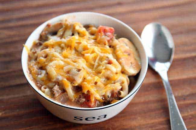 Cheesy Beef Skillet Dinner in a bowl with spoon on the side