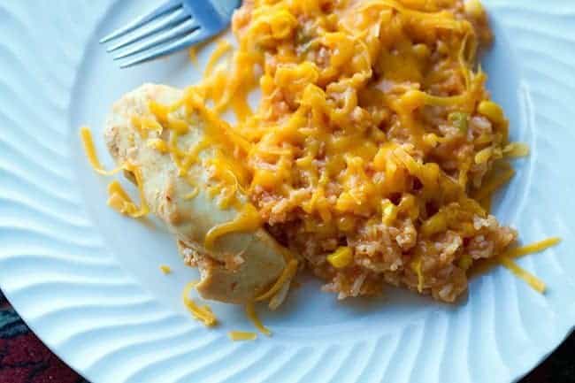 Tex Mex Chicken & Rice Bake in a white plate with fork