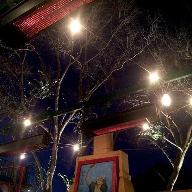 patio outside Oregano's Pizza with lights up