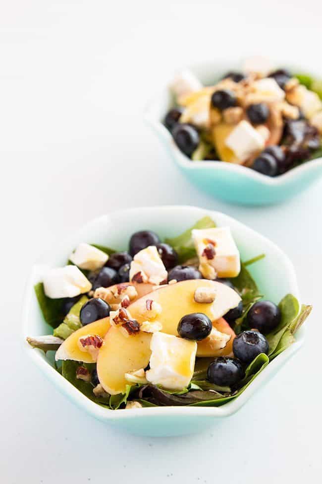 Mustard vinaigrette topped with apples, blueberries and Swiss cheese