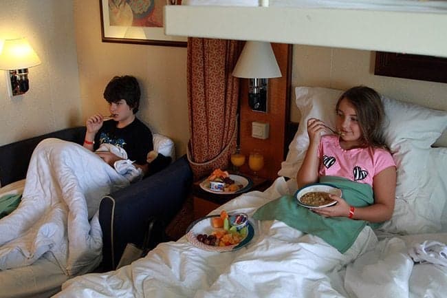 kids having their breakfast in bed
