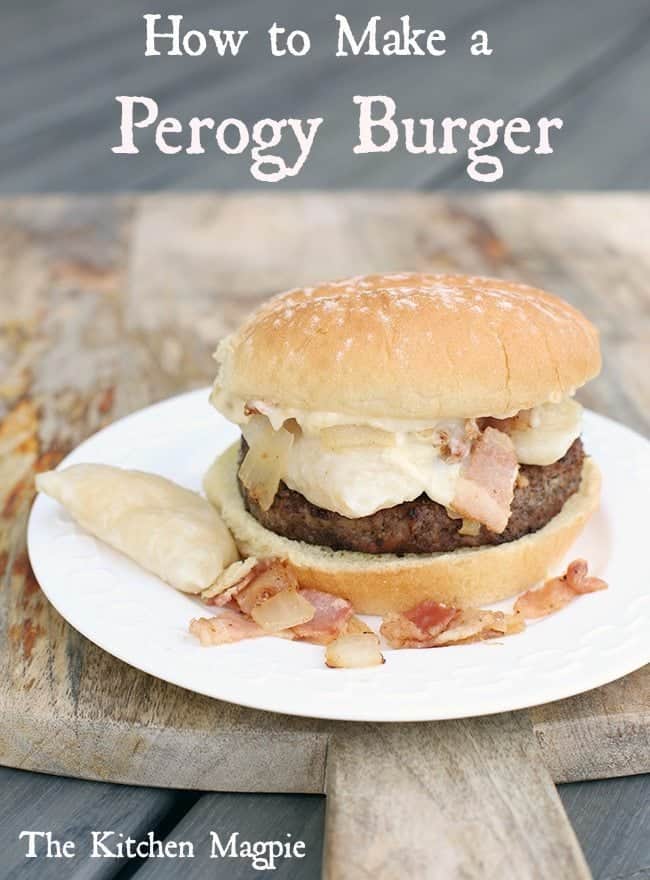 close up of Perogy Burger in a white plate on a wood board