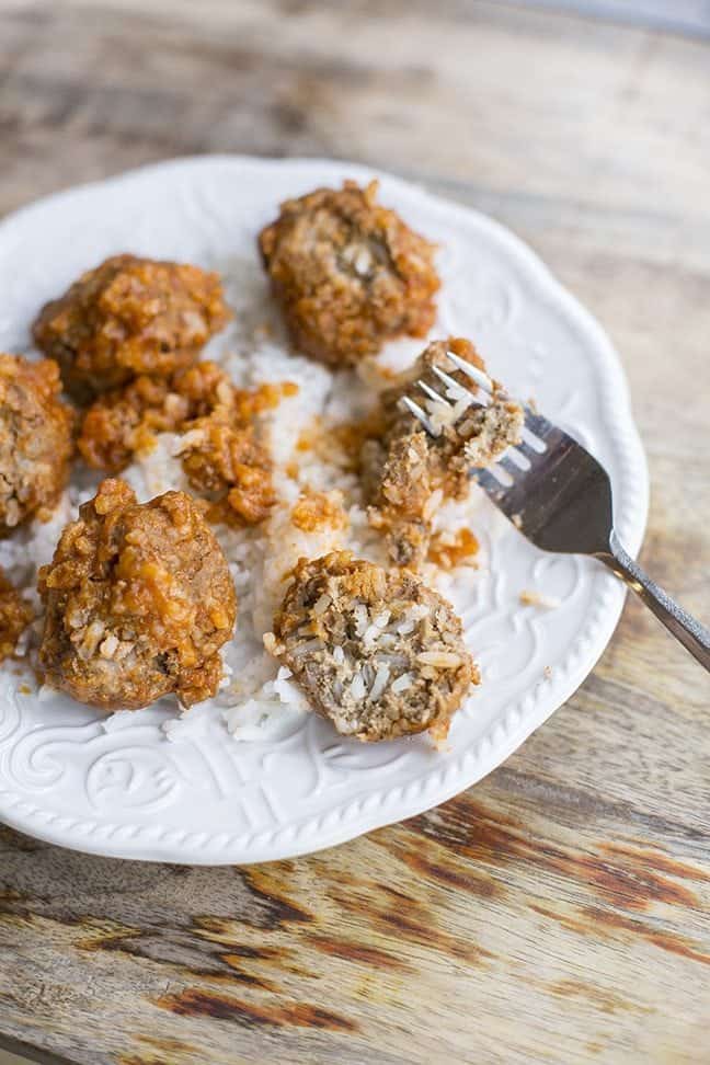 classic retro porcupine meatballs on a white plate with white rice