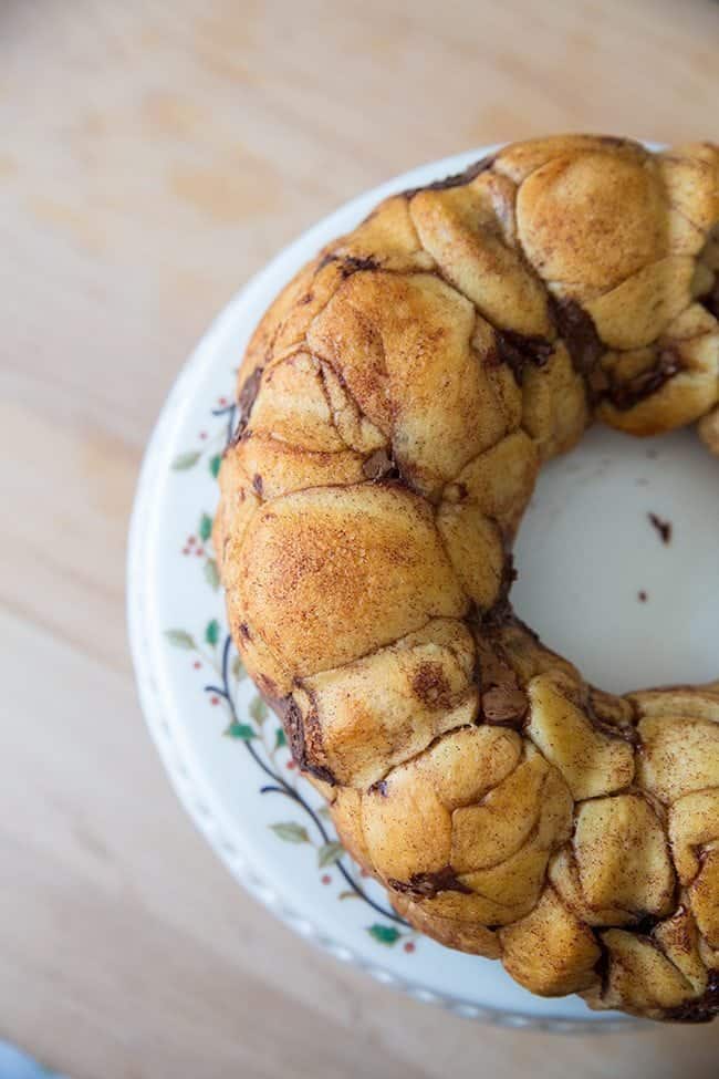 inverted baked Monkey Bread in a white plate