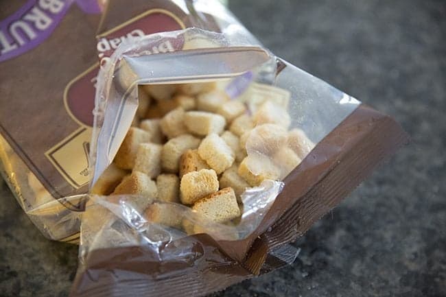 a pack of croutons for Apple Sausage Crockpot Stuffing