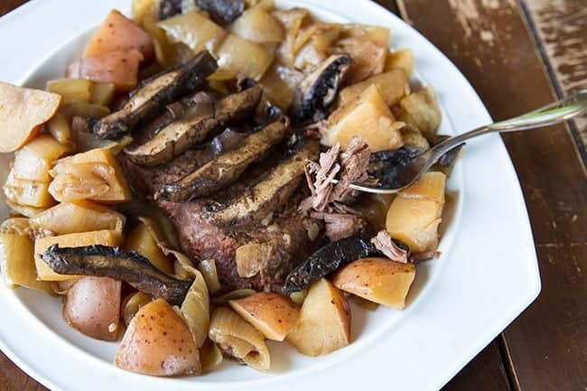 a plate of Flat Iron Steak with Portobello Mushrooms & Potatoes ready to be enjoy!