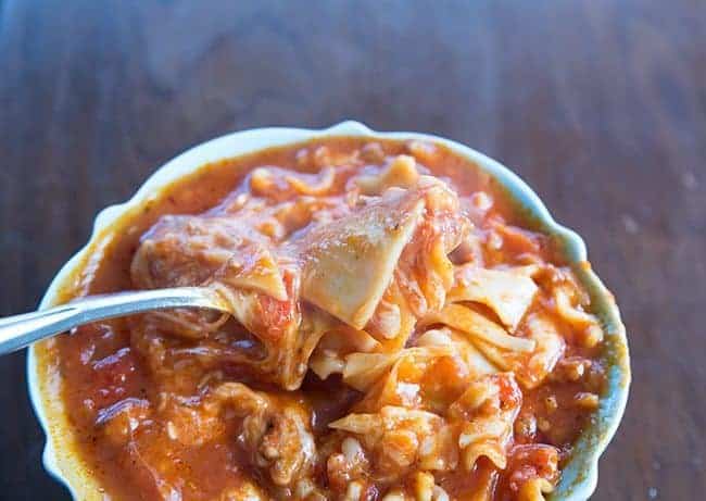 Italian Sausage Lasagna Soup in a blue bowl