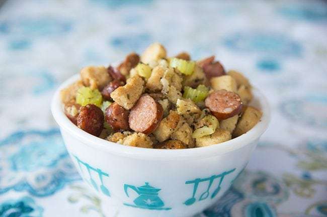 close up Apple Sausage Crockpot Stuffing in a white bowl