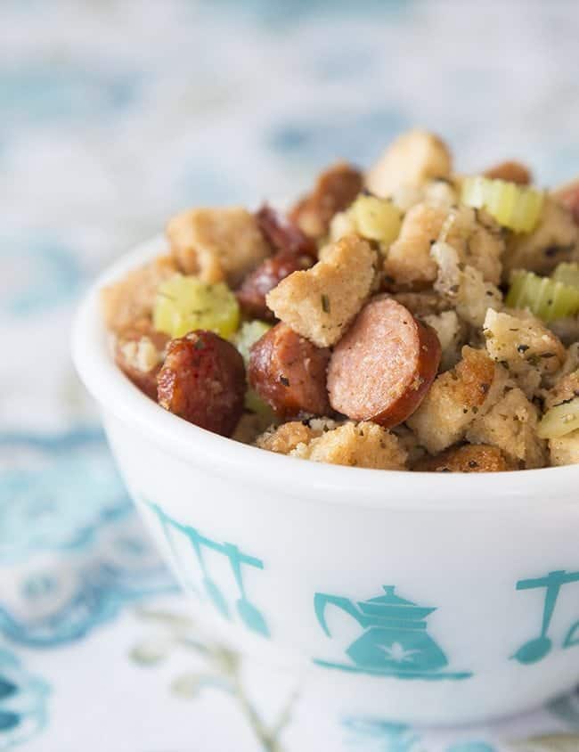 close up Apple Sausage Crockpot Stuffing in a white bowl