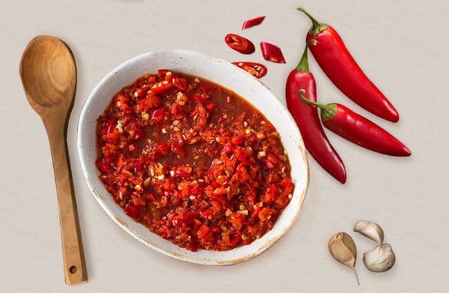 Spoon with Peppers in White Background